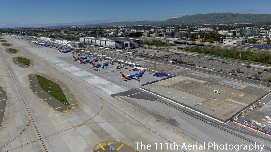 California's Norman Y. Mineta San Jose International Airport has empty parking lots and airliners parked at gates with nowhere to go during the coronavirus pandemic. Photo by Julie Belanger of The 111th Aerial Photography Squadron.