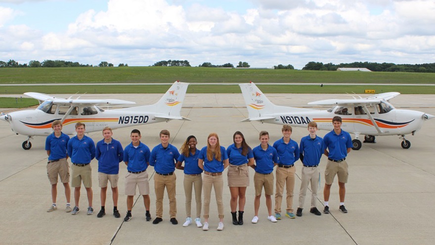 Twelve of thirteen West Michigan Aviation Academy graduates who earned their private pilot certificates during the summer of 2020 gather at the Gerald R. Ford International Airport to celebrate their success. Photo courtesy of West Michigan Aviation Academy.