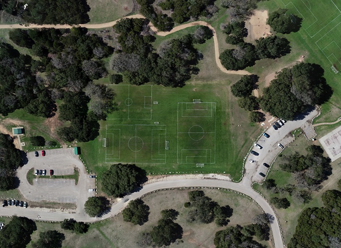 An orthorectified high resolution 2D image is created from 53 photos taken by a Phantom 4 Pro. This 2D "map" is what we typically might think of as a satellite view, looking straight down. Image created by Zach Ryall on WebODM.
