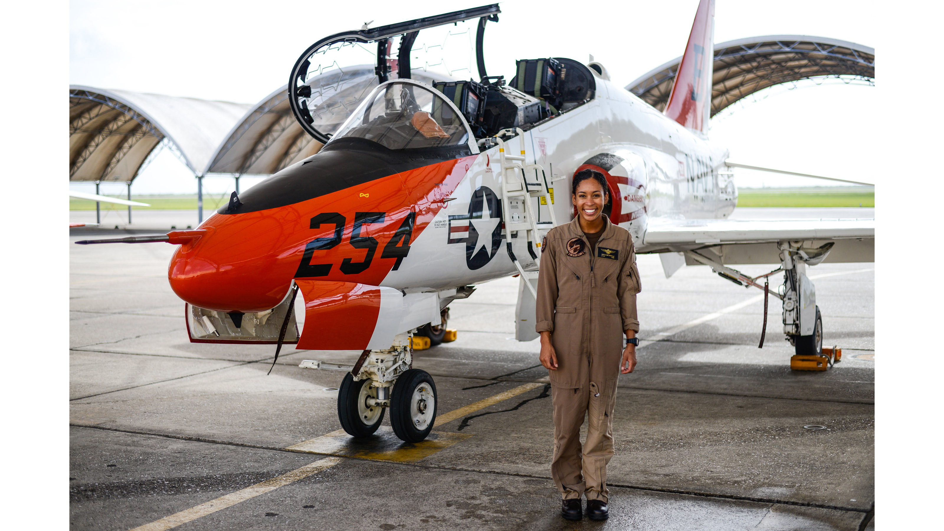 Lt. j.g. Madeline Swegle on completing the Tactical Air (Strike) aviator syllabus with VT-21 Redhawks at NAS Kingsville, Texas. Swegle is the U.S. Navy's first known Black female TACAIR pilot and will receive her Wings of Gold later this month. U.S. Navy photo by Lt. j.g. Luke Redito.