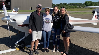 Parents Steven, left, and Sandy Mesinere, right, celebrate with daughters Macey and Allison after the sisters soloed sequentially at Beaver County Airport in Pennsylvania. Photo courtesy of Eric Stormfels, ACES Aviation.