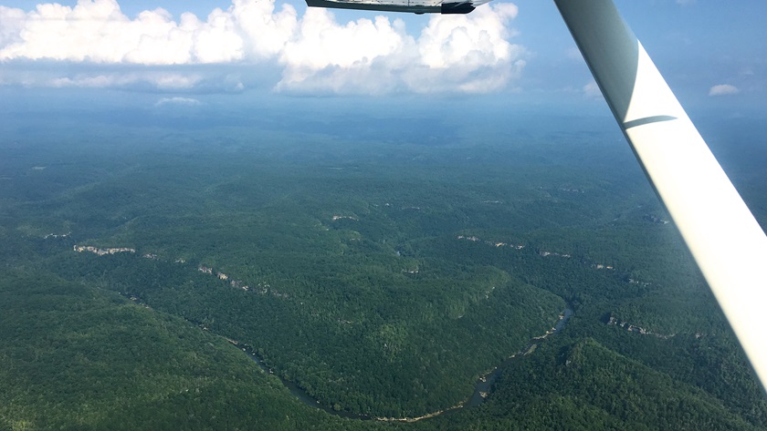 When the weather cooperates, the mountains and valleys of central West Virginia are a joy to view from the air. Photo by Chris Eads. 