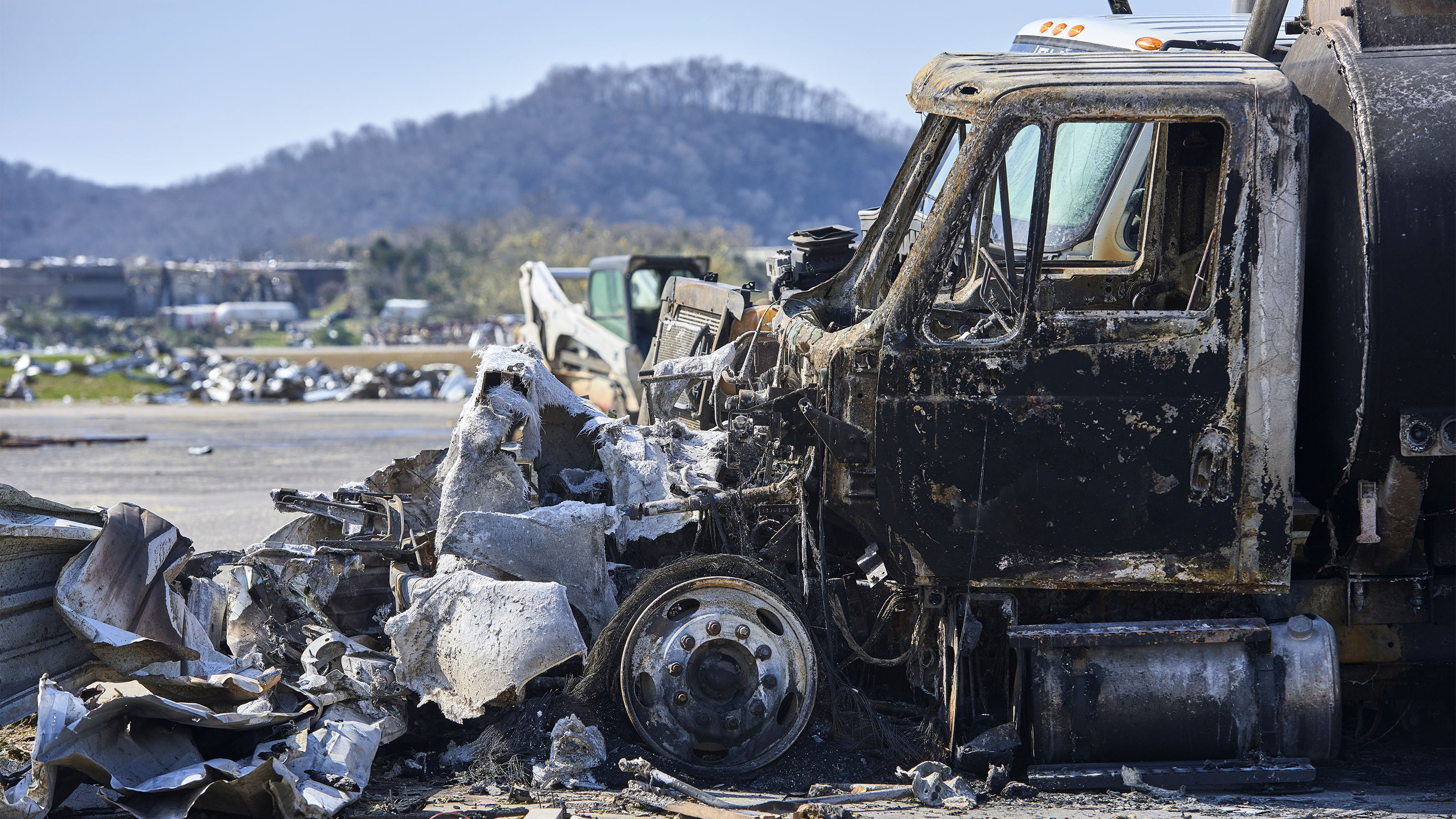 A fuel truck caught fire at John C. Tune Airport in Nashville after a tornado ripped through the area early March 3. Photo by Harrison McClary.