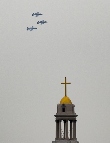 A church spire frames Maryland National Guard 175th Wing pilots performing a three-ship flyover of downtown Frederick, Maryland, to honor frontline COVID-19 responders and essential workers Friday, May 8, 2020. Photo by David Tulis.