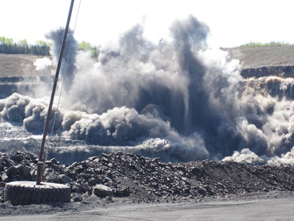 A Minnesota mine is blasted during the ore extraction process at ArcelorMittal USA. Photo courtesy of ArcelorMittal USA.