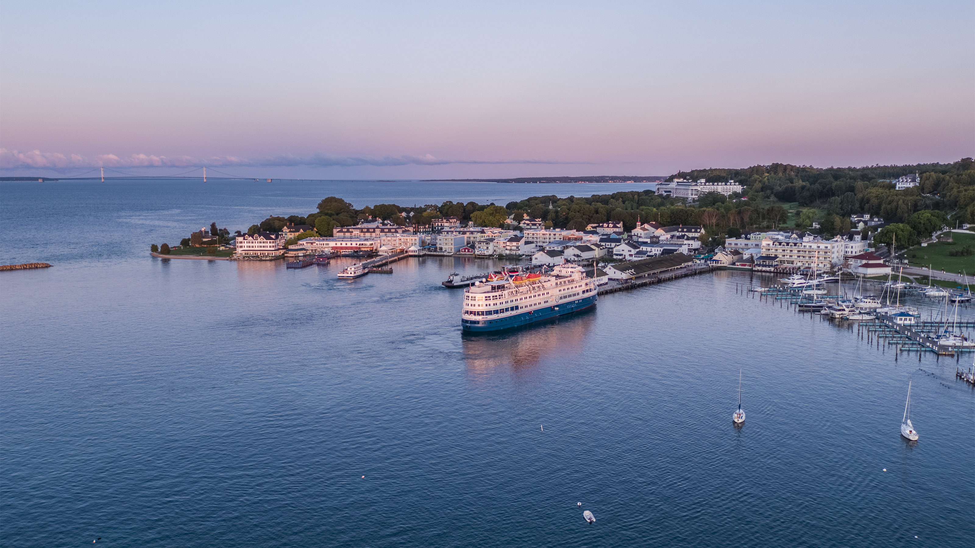 Boats come into harbor at Mackinac Island at sunrise. Photo courtesy of the Mackinac Island Tourism Bureau. 