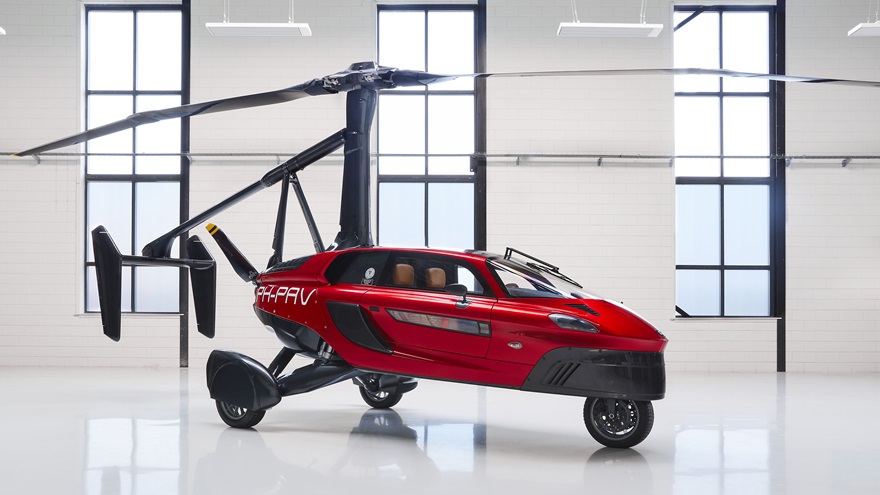 The PAL-V Liberty is a gyrocopter with folding blades and tail booms that transforms into a roadable three-wheeled vehicle. Photo courtesy of PAL-V.