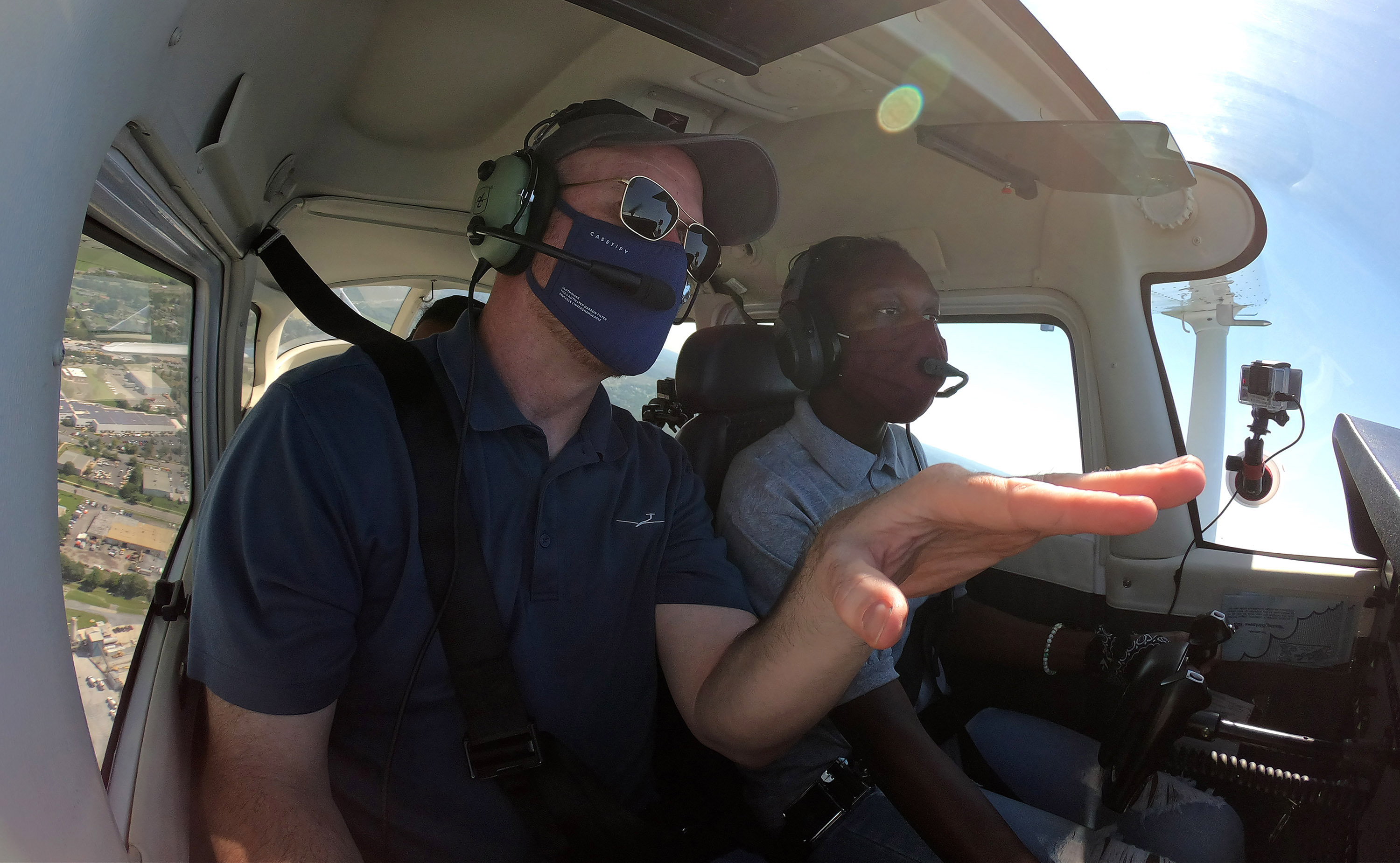 AOPA Senior Director of Flight Training Education Chris Moser and Maryland high school student Victoria Wentt fly in a Cessna 172.