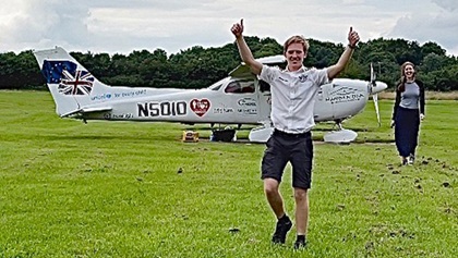 Travis Ludlow, 18, celebrates a 44-day, 16 country circumnavigation in a diesel-powered Cessna 172 Skyhawk in a photo posted on Instagram. Photo courtesy of Travis Ludlow.