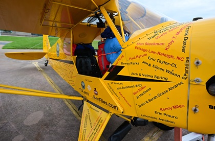 The front seat of a Piper J-3 Cub contains backpacking gear, a tent, and other necessities for Ben Templeton's 48-state flight. Photo by David Tulis.                                                                             