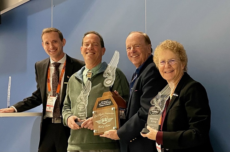 Veteran CFIs (from left, holding trophies) Greg Brown, John King, and Martha King were inducted into the Flight Instructor Hall of Fame administered by the National Association of Flight Instructors in October. NAFI now seeks nominations for induction in 2022. Photo courtesy of NAFI.