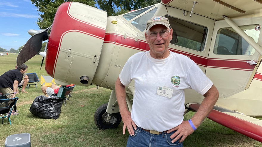 Jim Wilson stands in front of his cabin class Waco at the fifteenth annual Triple Tree Fly-In in Woodruff, South Carolina. Photo by Cayla McLeod Hunt.