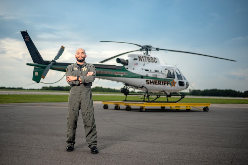 Danny Casanova stands in front of the Seminole County Sheriff’s Office’s Airbus H125. Photo by Lyssa Koo, Seminole County Sheriff’s Office. 