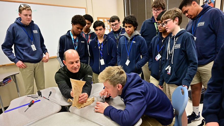 Greenville Technical Charter High School students surround AOPA High School STEM Curriculum science teacher Doug Adomatis during a hands-on venturi exercise in Greenville, South Carolina, January 22, 2020. Photo by David Tulis.