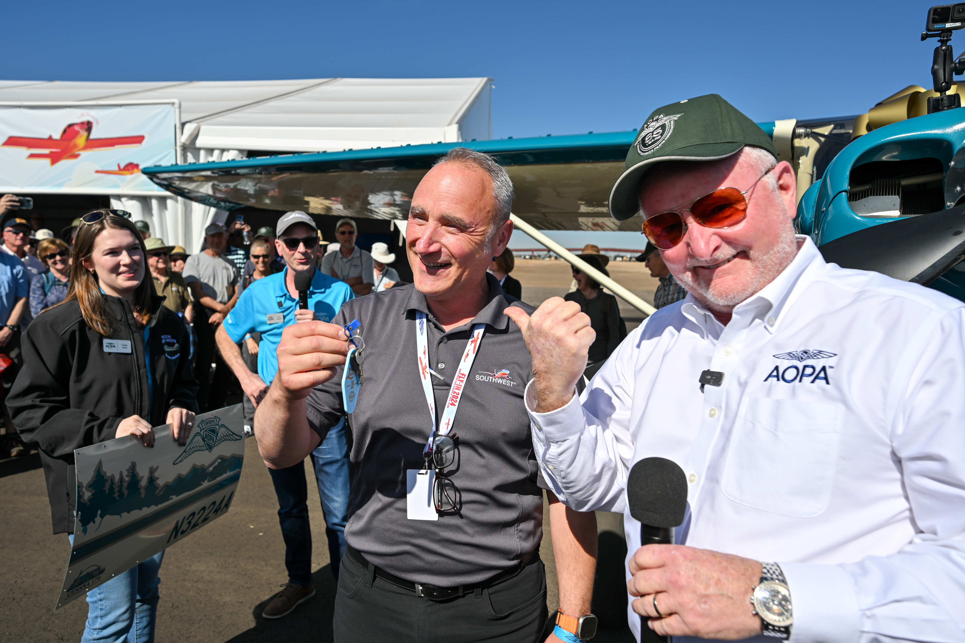 Cliff Gurske was handed the keys to the AOPA Sweepstakes Cessna 170B during the Buckeye Air Fair in Buckeye, Arizona. Photo by David Tulis.