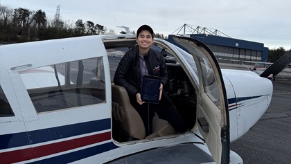 Lilli Clark, student pilot and co-developer of No Brashers, charting her own path in aviation in a Piper Cherokee. Photo courtesy of Lloyd Clark.