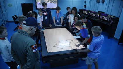 Campers participate in groups called “squadrons” and work through missions together.