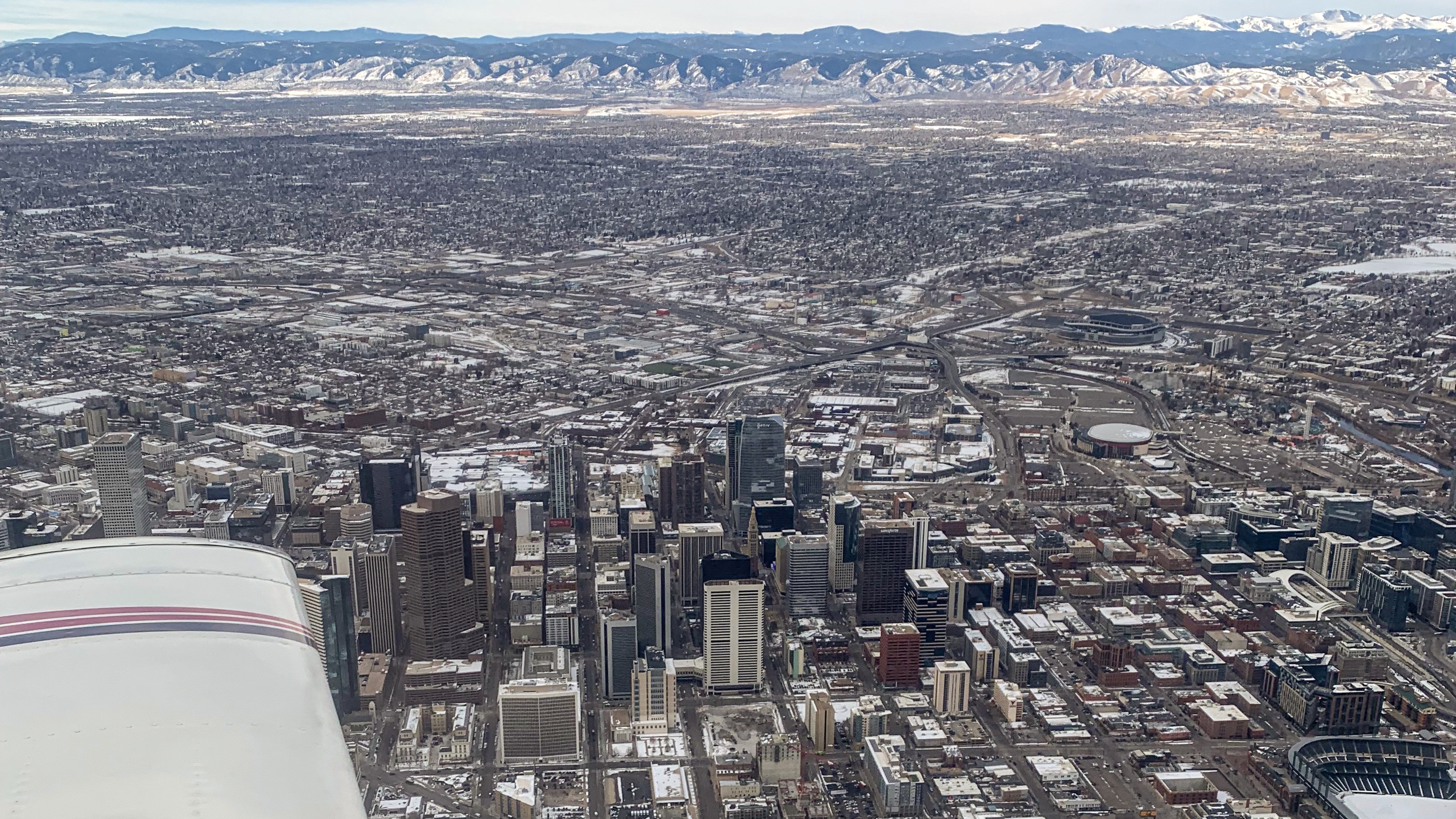 Flying over downtown Denver in Leading Edge’s Piper Archer.