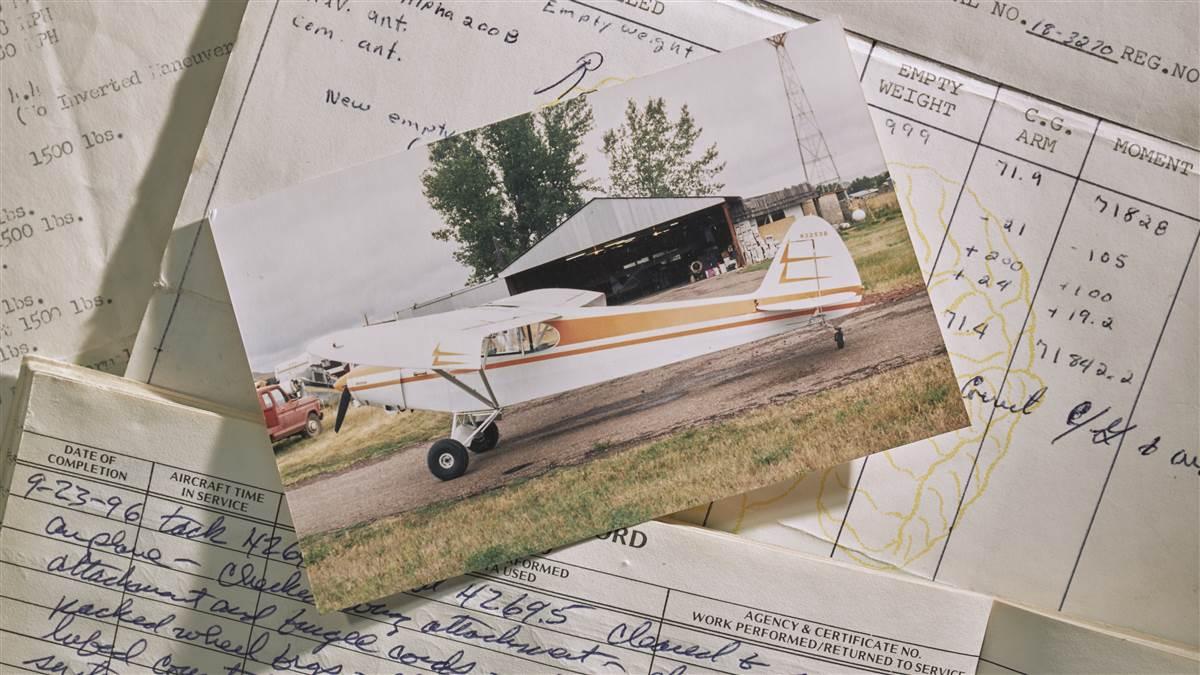 Photography of the 2018 AOPA Sweepstake Piper Super Cub restoration by Baker Air Service's Roger  and Darin Meggers. Shown is a photograph of the Cub before the accident, along with log books.Baker Air Services (BHK)Baker, MT USA