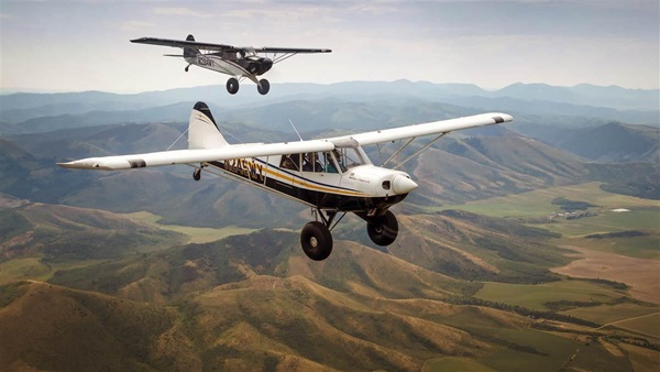 Contest winners Zack Schmidt and Jeff Auen cross western Wyoming in a pair of brand-new Aviat Huskys. The rugged, purpose-built airplanes are ideally suited to the high terrain and rocky airstrips. Each winner was accompanied by a highly experienced instructor.