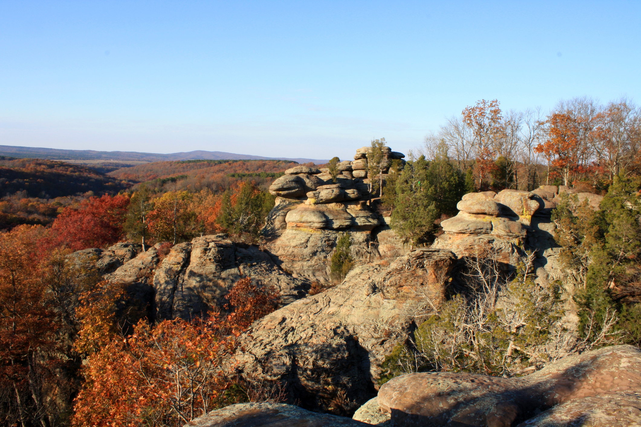 A unique rock formation at Garden of the Gods is surrounded by bright fall colors in Shawnee National Forest.