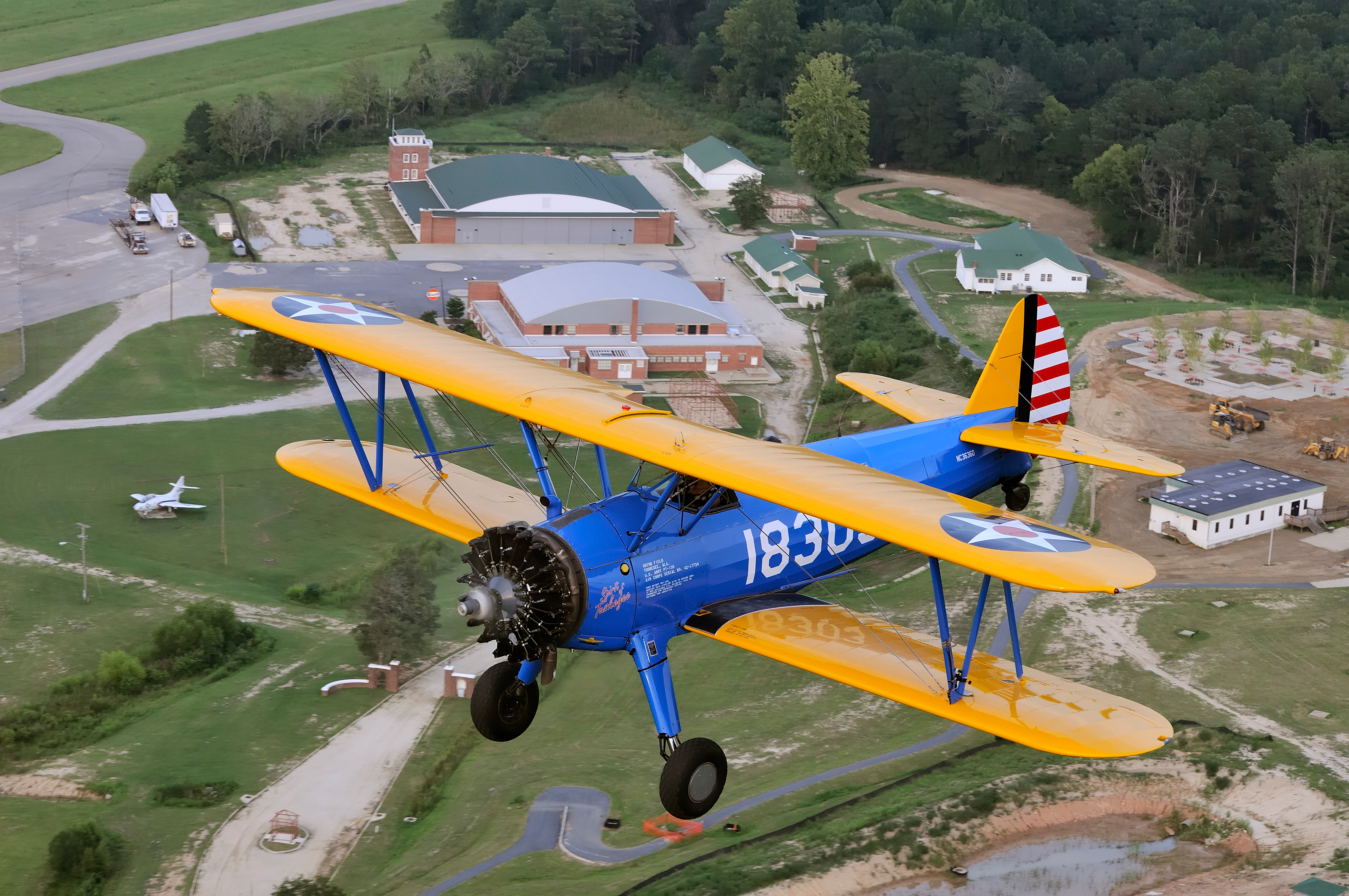 “Honoring the Tuskegee Airmen,” December 2011 'AOPA Pilot': When I learned Matt Quy’s 1944 Boeing PT–13 Stearman would be displayed in the National Museum of African American History and Culture, I suggested photographing it over the Tuskegee Airmen National Historic Site at Moton Field Municipal Airport in Tuskegee, Alabama—where it was first assigned during World War II, training the military’s first Black aviators. The sense of history was palpable when I snapped the shutter. (Nikon D300S, 70 mm, 1/60, f/8, ISO 200)
