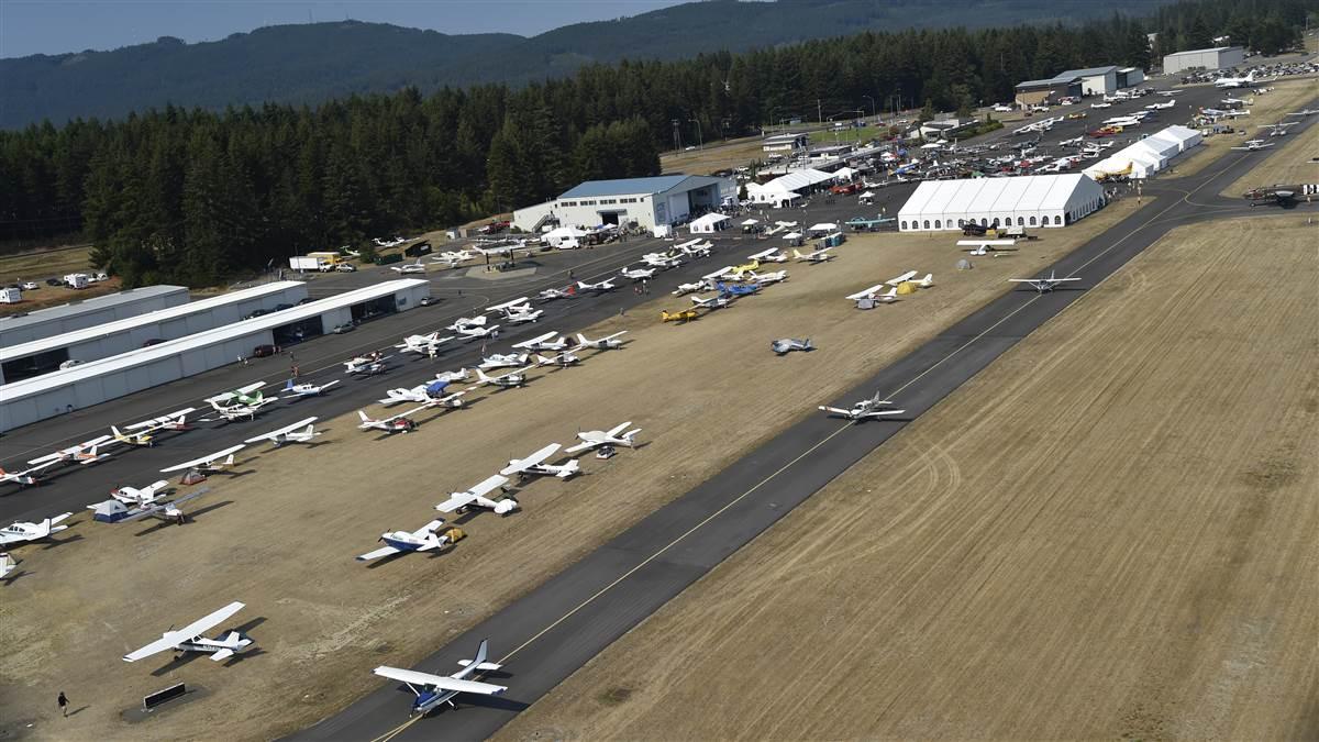 Aviation enthusiasts set an AOPA regional fly-in record by flying 690 aircraft and driving 1,064 automobiles to Bremerton National Airport for the AOPA Fly-In at Bremerton, Washington, Aug. 20. Photo by David Tulis.