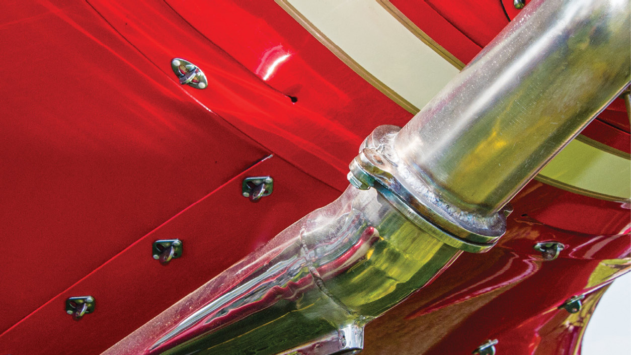 All nine cylinders exhaust through a single pipe.