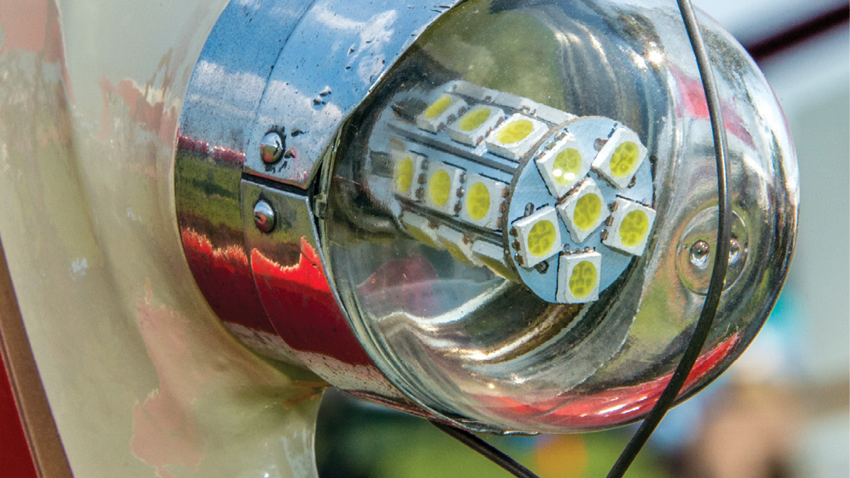 Modern lights were skillfully adapted to old fixtures.