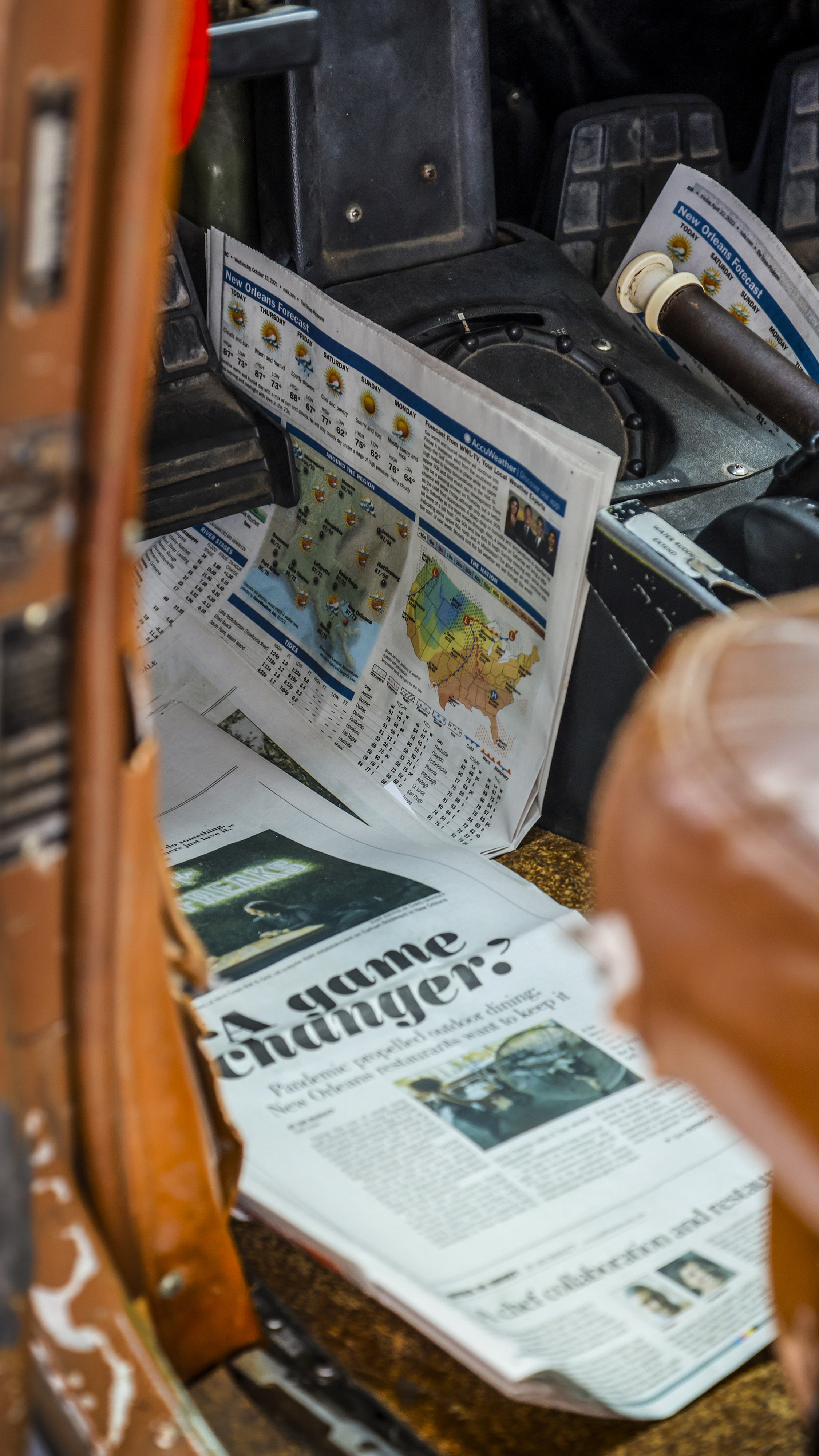 The company seaplanes are lined with newspapers because of the corrosive nature of saltwater-soaked shoes.