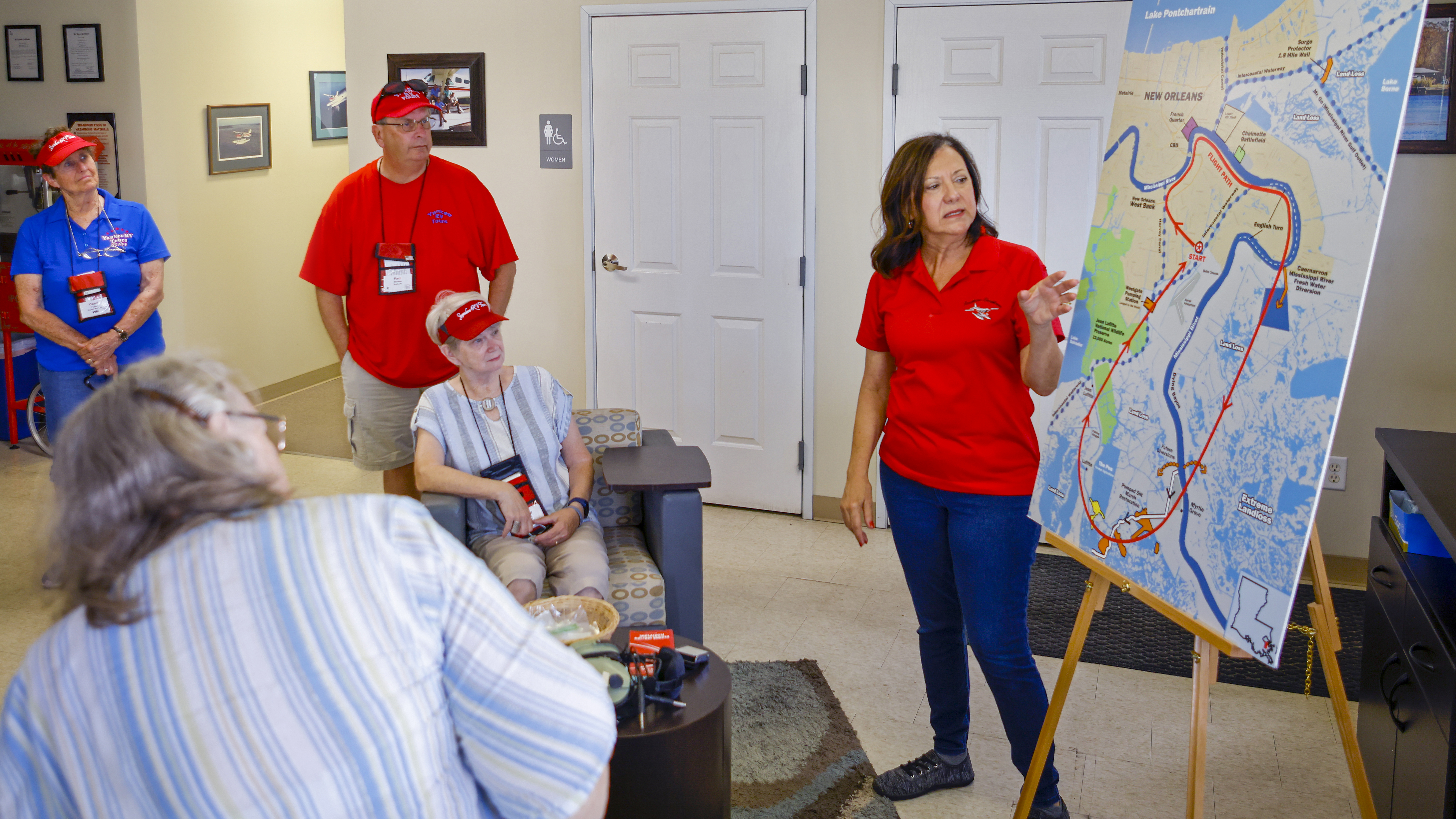 Rhonda describes for tour customers the flight they will take over the bayou and along the New Orleans skyline.