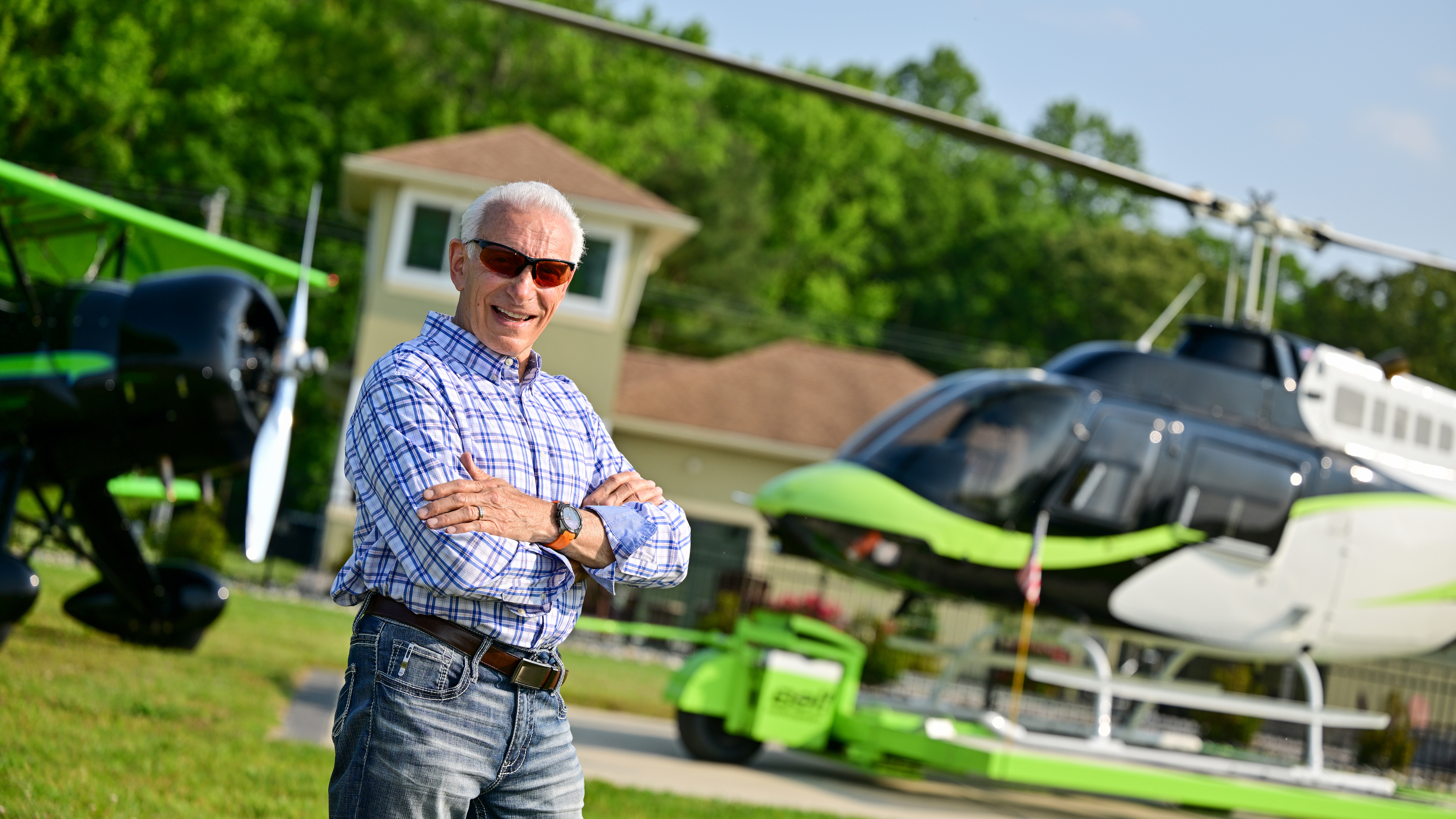 Masone, Linda, and the beagles live at Eagle Crest-Hudson Airport near Georgetown where he keeps his restored 1940 Waco and Jet Ranger.