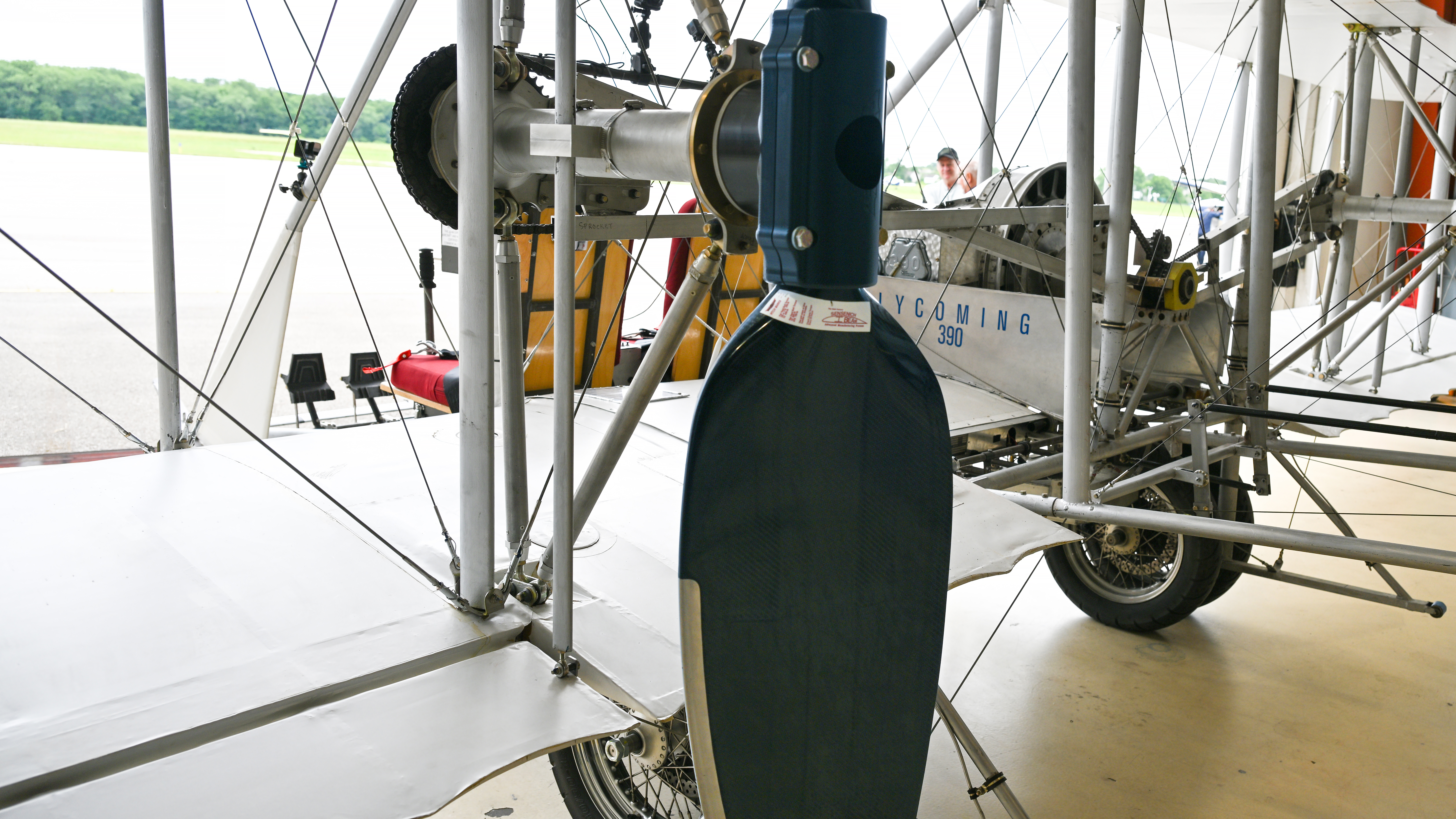 Scalloping on the trailing edge mimics the look of fabric stretched over the ribs in the original Model B. Although the Wright Company delivered B models with wing-warping systems, almost all were eventually modified with ailerons. 