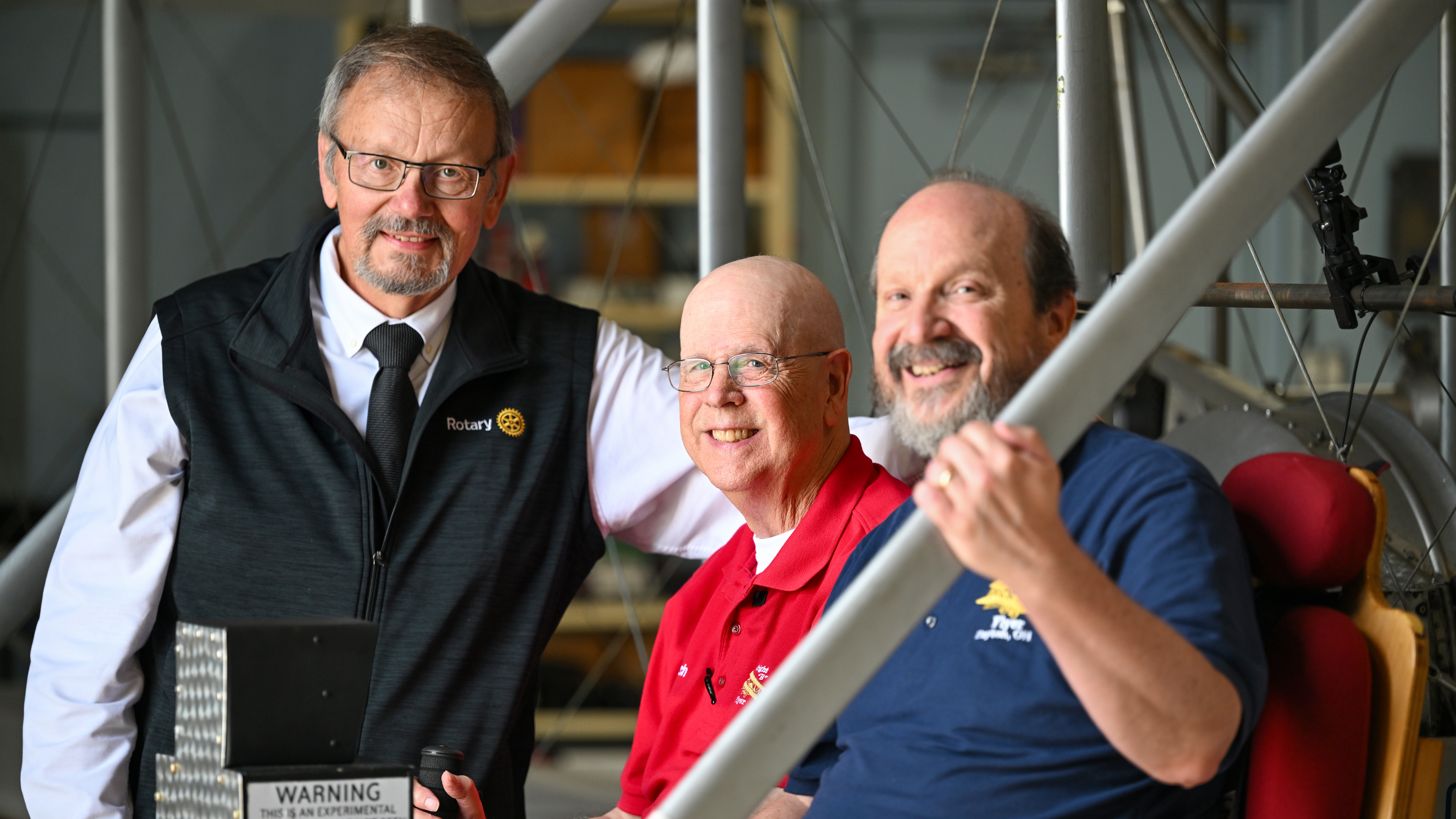 Wright B. Flyer Inc. President Don Adams, Chief Pilot Rich Stepler, and Special Activities Coordinator Steve Donaldson, left to right, are among the volunteers who meet regularly to keep the memory of the Wright brothers alive.
