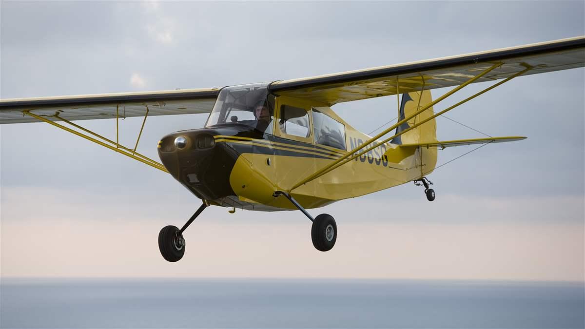 Aerial photography of the Champ 7EC with the Continental 0-200-A 100hp engine, light sport aircraft.
Sanford, FL  USA
07-574_125.CR2,Canon EOS-1Ds Mark II