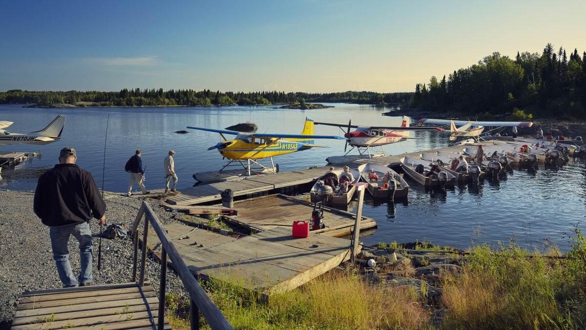Photography of Seaplanes Adventures float plane tour up to Churchill, Manitoba, Canada for Lazy Bear Expedition's outings for polar bear and Beluga whale spotting. Shown is the first stop at God's Lake Elk Island Lodge for trout and walleye fishing with Barry Power and AOPA's Dave Hirschman.
 
God's Lake
Elk Island Lodge, Manitoba  Canada