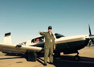 The congressman and his 1998 Mooney M20M in Malta, Photo courtesy of Rep. Steve Pearce.