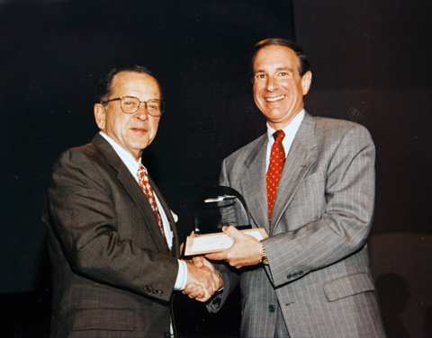 Stevens receiving award