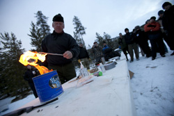 Pilots learn how to mix fuel and oil to start a fire.