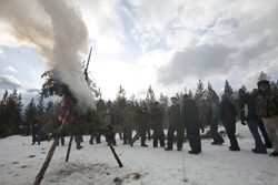 Burning pine boughs creates smoke signals.