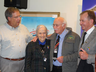 IAOPA President Craig Fuller (left) and AOPA-South Africa President Koos Marais (right) with founding member Hendrik Pistorius and his wife, Gertie.