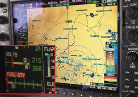 The G1000 display in Spencer's aircraft approaching Slave Lake. The fuel gauge is enlarged in the inset.
