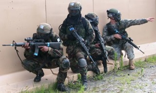 Soldiers wearing ABM system under helmets. Honeywell image.