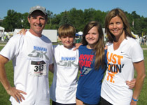 The Douglas family participates in the Runway 5K Run/Walk.