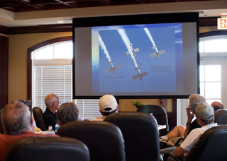 A PowerPoint presentation shows four RV-8s in a diamond.