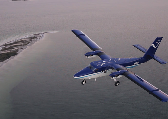 A Twin Otter cruises over Florida waters.