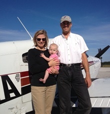 Meredith and Dana Holladay, who flew a Piper Cub to all 48 lower states in 2012, pictured with their daughter, Alex.