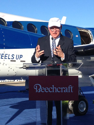 President and CEO Bill Boisture of Beechcraft addresses reporters at an NBAA press conference in front of the first King Air 350i to be delivered to Wheels Up, a new company providing low-cost access to business aircraft.