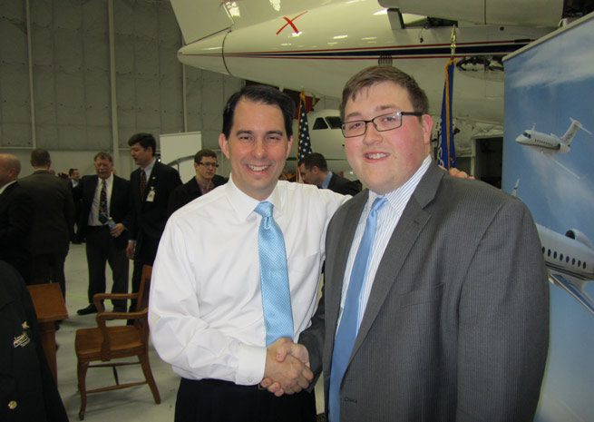 Wisconsin Gov. Scott Walker and AOPA Great Lakes Regional Representative Bryan Budds. Photo by Dave Weiman, courtesy of Midwest Flyer Magazine.