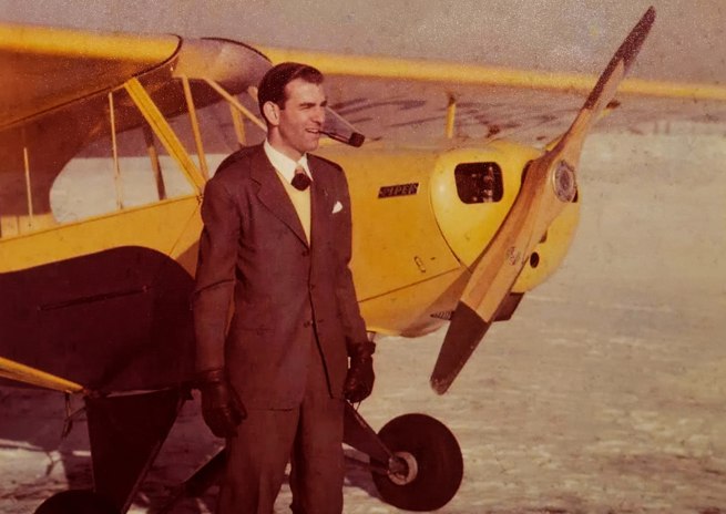 Clancy Hess with a 40-horsepower Taylorcraft.